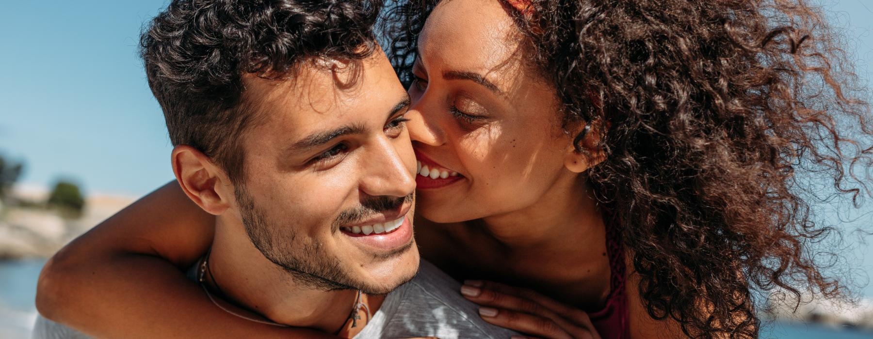 a man and woman embracing