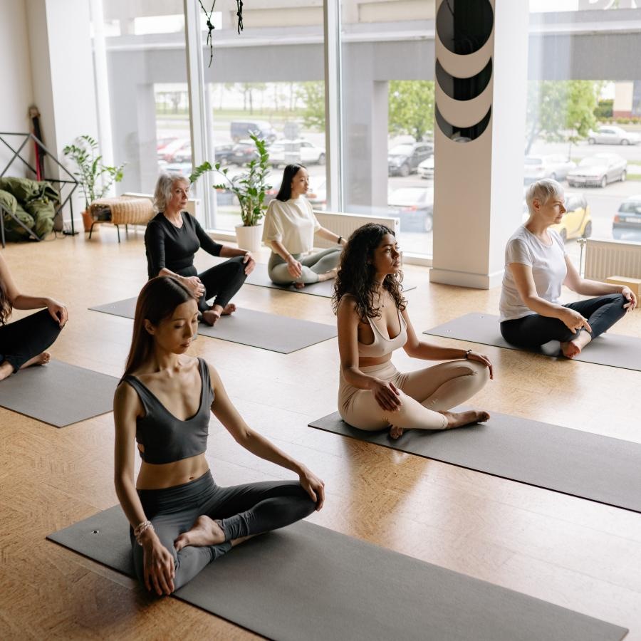 a group of women sitting on the floor