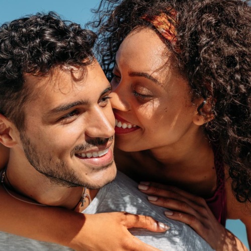 a man and woman embracing